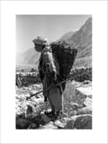 Tajik boy carrying a basket