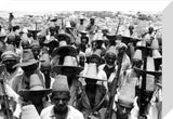Arab men wearing straw hats