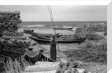 Reed mats and boats at Qubba