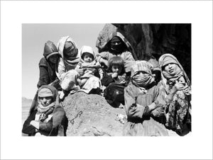 Women and children sheltering in a cave