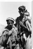 Gujar men carrying bags