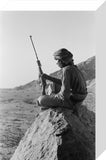 Salim bin Kabina with a rifle