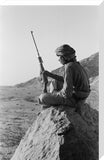 Salim bin Kabina with a rifle