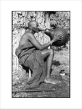 Samburu man with a beer pot