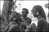 Samburu moran braiding hair