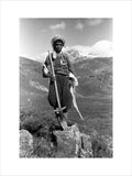 Baliki boy holding a spade