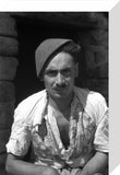 Assyrian man wearing a hat
