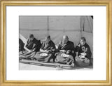 Four monks eating