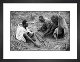 Maasai men playing mancala