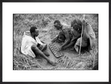 Maasai men playing mancala