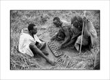 Maasai men playing mancala