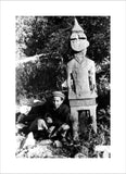 Boy with a carved wooden figure