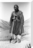 Hazara farmer holding a spade
