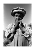 Nuristani boy wearing a felt hat