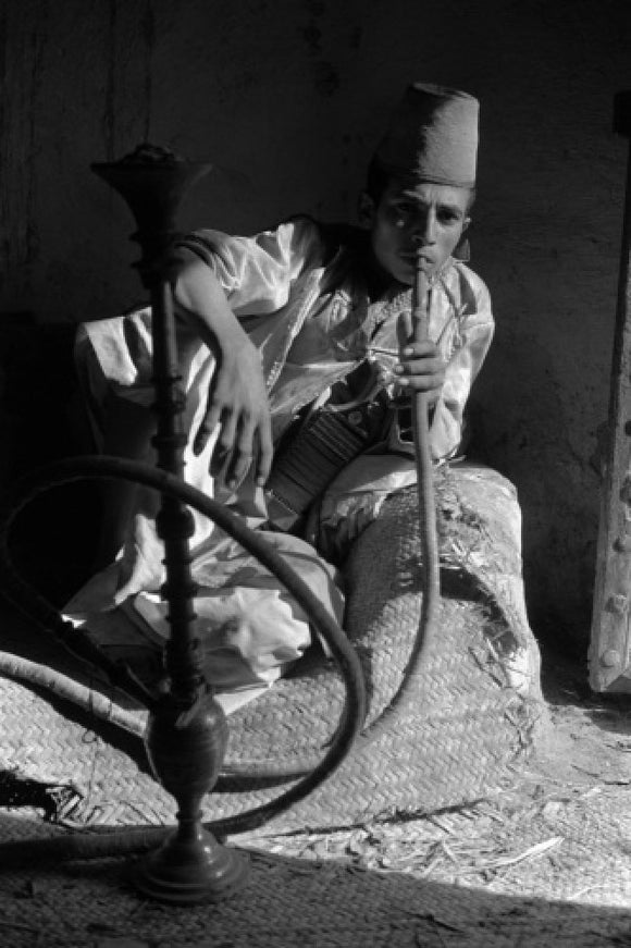 Man smoking a water-pipe