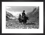 Kirghiz men riding yaks