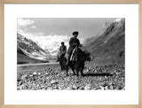 Kirghiz men riding yaks