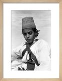 Arab boy wearing a conical hat