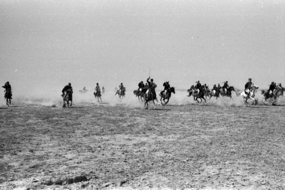 Al Essa men on horseback