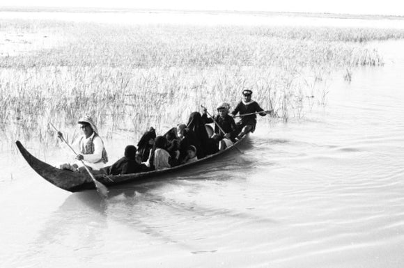 Madan people in a boat in the Marshes