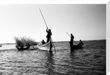 Madan men in boats in the Marshes