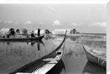 Boats at a settlement in the Marshes
