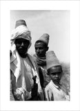 Arab men wearing conical hats
