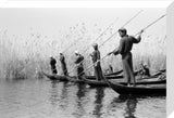 Fartus men spear fishing