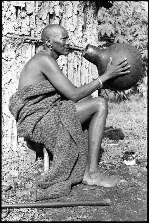 Samburu man with a beer pot