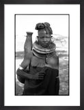 Turkana woman carrying a water vessel