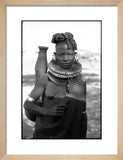 Turkana woman carrying a water vessel