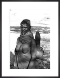 Turkana woman carrying a water vessel