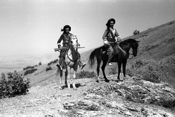 Pizdhar men on horseback