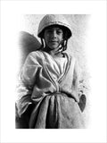Yazidi boy wearing a hat