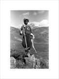Baliki boy holding a spade