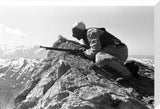 Kurdish man with a rifle hunting bear