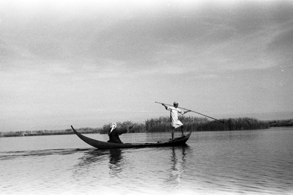 Shaghanba men spear fishing