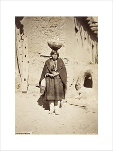 Zuni woman carrying a pottery vessel