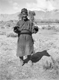 Tibetan shepherd with sling