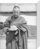 Monk holding the seal of Tsurphu