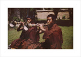 Monks blowing trumpets