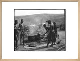 Zulu men cooking meat