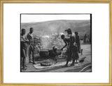 Zulu men cooking meat