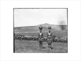 Zulu women carrying beer vessels