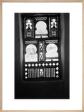 A carved wooden screen in ...