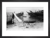 View of beached and moored ...