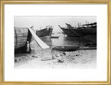 View of beached and moored ...