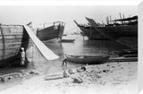 View of beached and moored ...