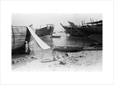 View of beached and moored ...