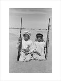 Seated portrait of two young ...